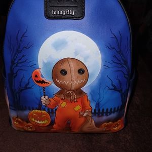 Loungefly glow in the dark mini backpack